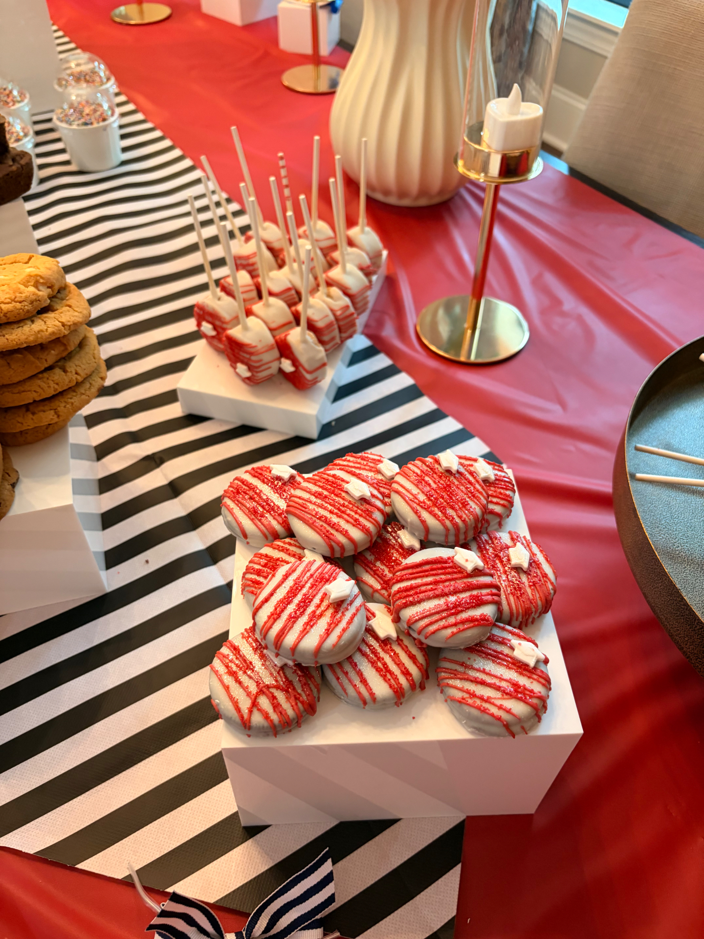 Dipped Oreos and cake pops for a graduation