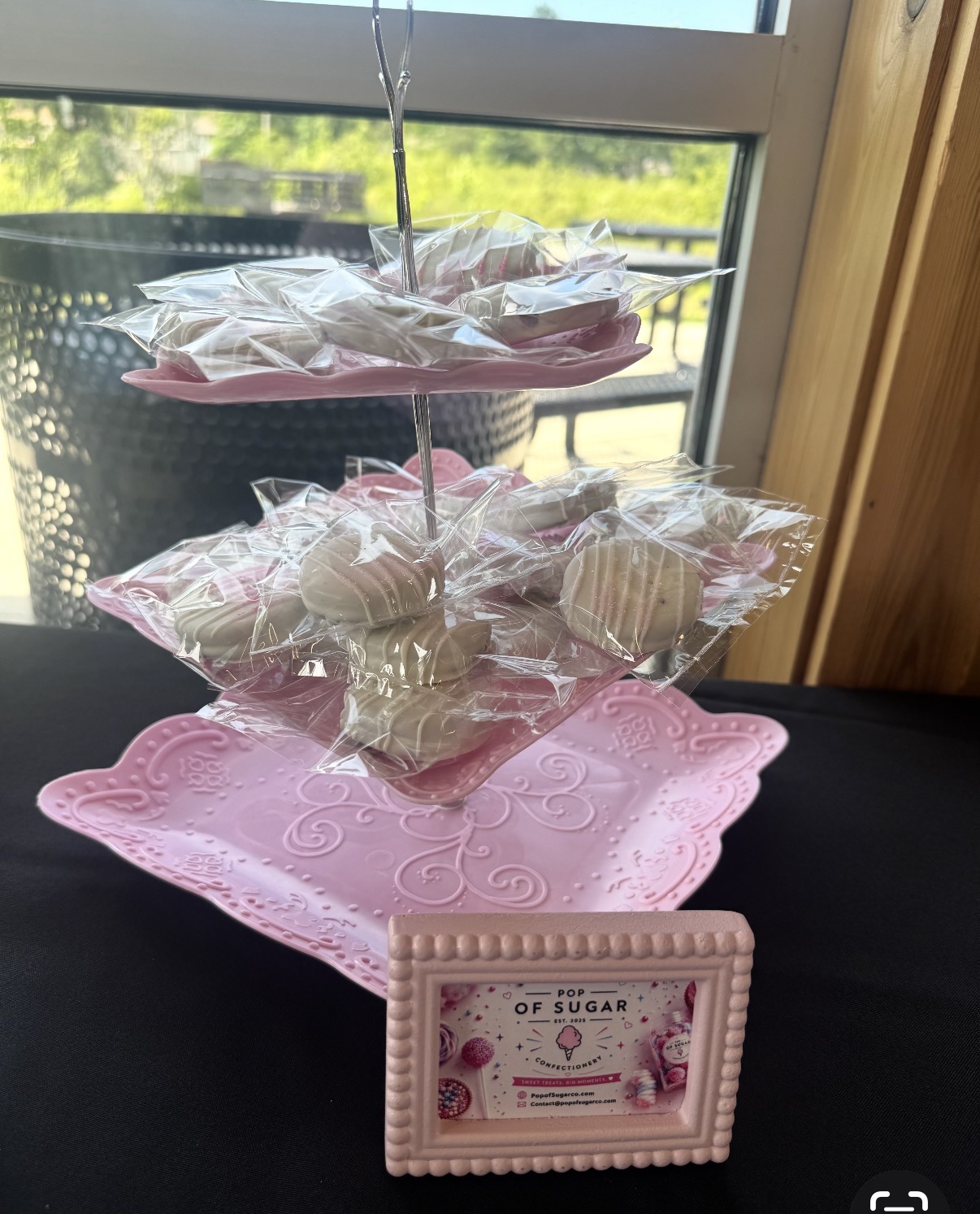 Display of pink dipped Oreos