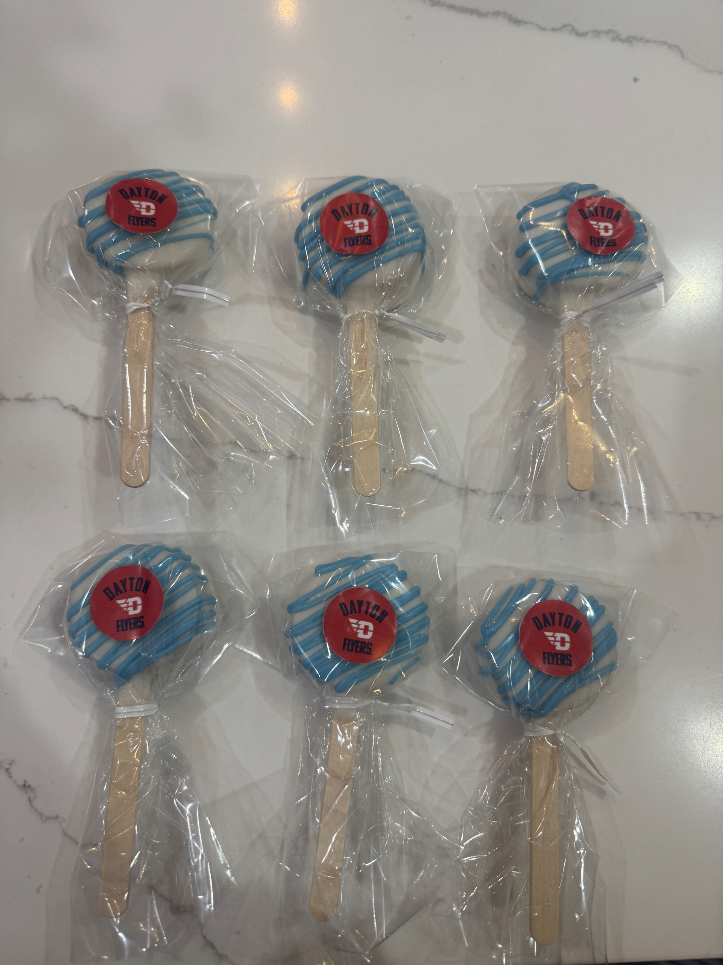 Grid of Dayton Flyers cake pops