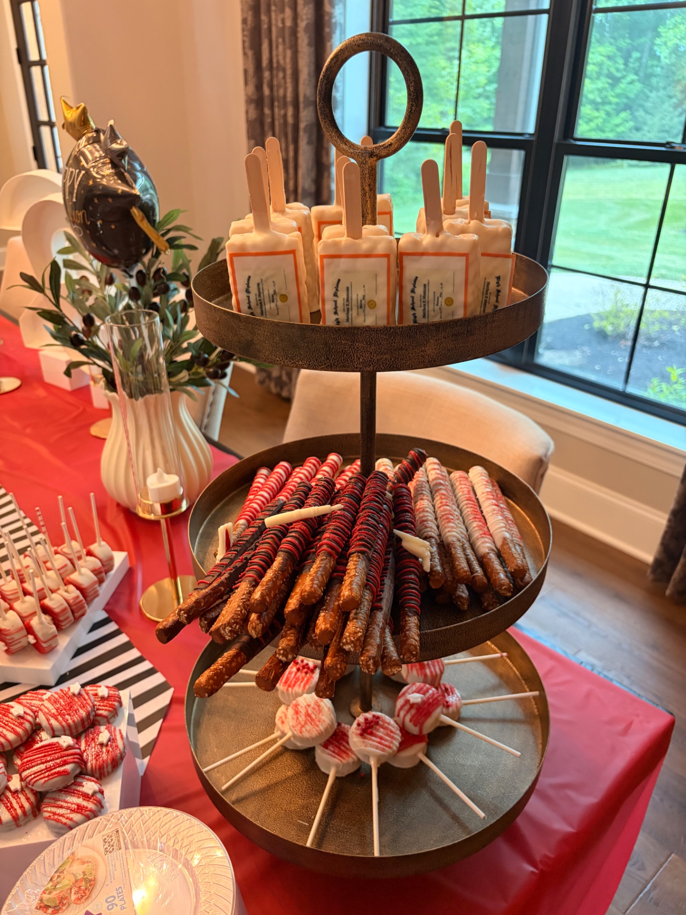 Tiered tower of graduation treats