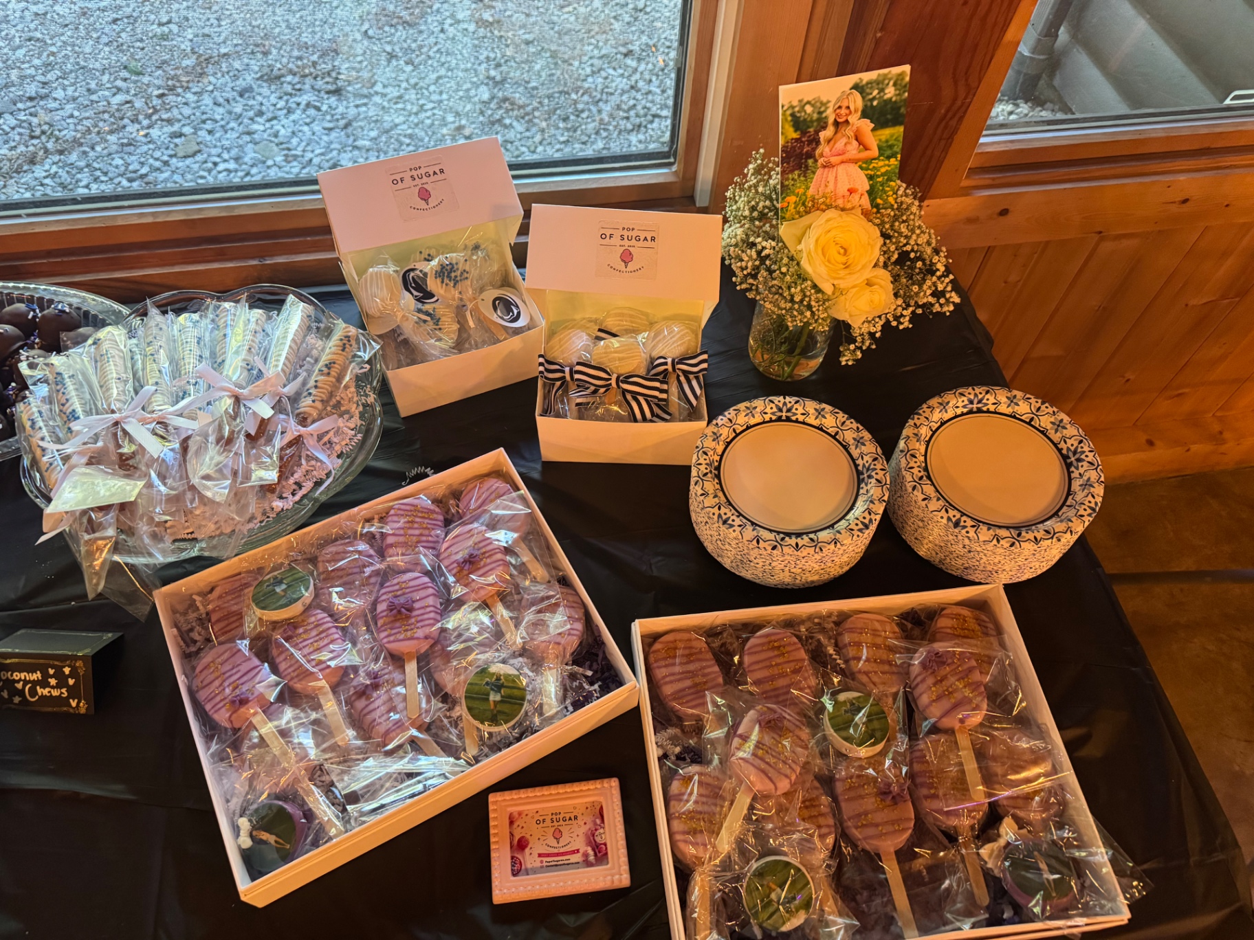 Graduation dessert table with cakesicles and dipped Oreos